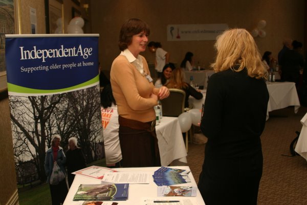 Inside the venue with desks and leaflets of various charities on display