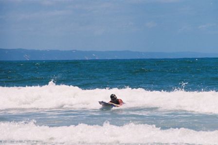 Photo of Simon surfing